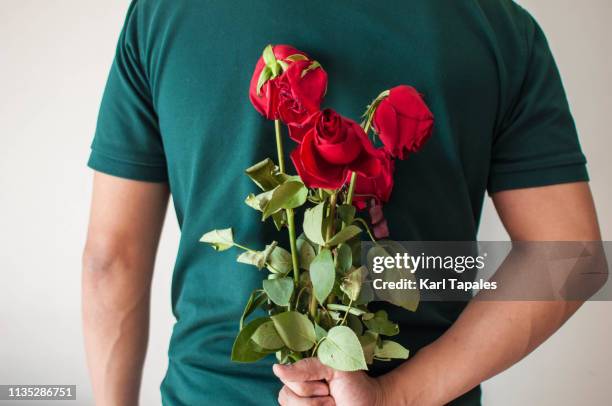 Manly Roses Man Holding Roses Photos and Premium High Res Pictures - Getty Images