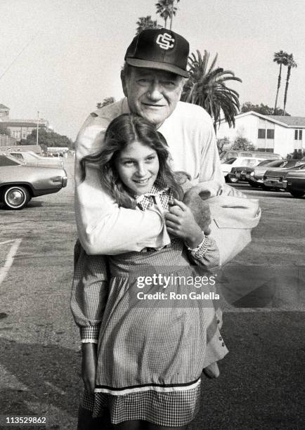 John Wayne And Daughter Marissa Wayne during Celebrity Baseball Game - April 17, 1977 at USC in Los Angeles, CA, United States.