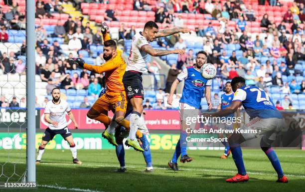 Bolton Wanderers' Josh Magennis looks on as Ipswich Town's Josh Emmanuel scores an own goal during the Sky Bet Championship match between Bolton...