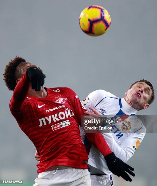 Ze Luis of FC Spartak Moscow vies for the ball with Kirill Nababkin of PFC CSKA Moscow during the Russian Premier League match between FC Spartak...