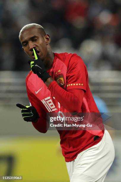 Anderson Souza Conceicao of Guangzhou Evergrande celebrates after scoring a first goal during the AFC Champions League Group F match between Daegu...