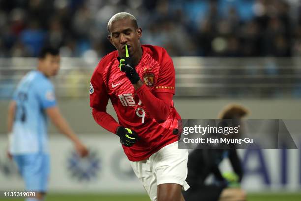 Anderson Souza Conceicao of Guangzhou Evergrande celebrates after scoring a first goal during the AFC Champions League Group F match between Daegu...