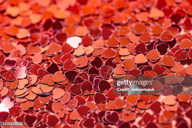 heart shape red confetti - party konfetti stockfoto's en -beelden