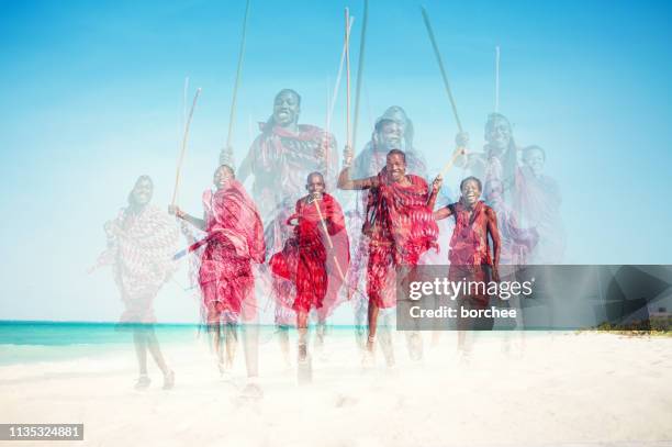 masai warriors on the beach - multiple exposure running stock pictures, royalty-free photos & images