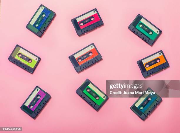 vintage background, with colorful cassette tapes - obsolete fotografías e imágenes de stock