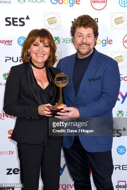 Lorraine Kelly and Michael Ball pose with the Special Award during the 2019 'TRIC Awards' held at The Grosvenor House Hotel on March 12, 2019 in...