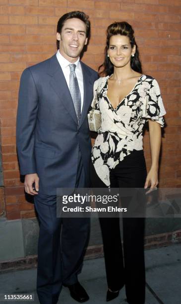 Jason Sehorn and Angie Harmon during "Vote FCUK 2004" - A French Connection/"Rock the Vote" Event at Soho French Connection Store in New York City,...