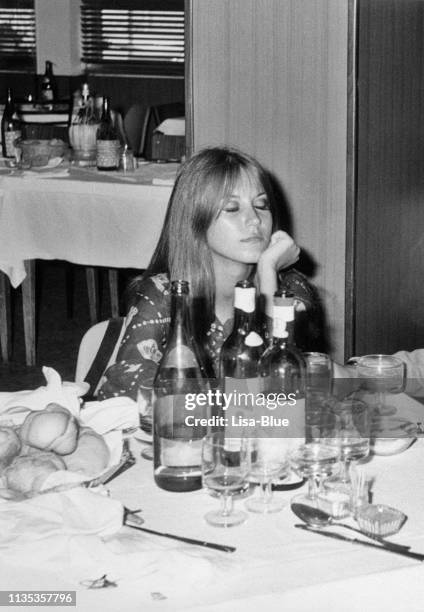 young woman in a restaurant in 1968 - italian restaurant stock pictures, royalty-free photos & images