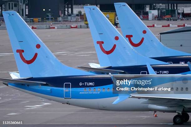 Boeing 737 Max-8 aircraft are parked up at a gate in the terminal of Manchester Airport on March 12, 2019 in Manchester, England. The Civil Aviation...