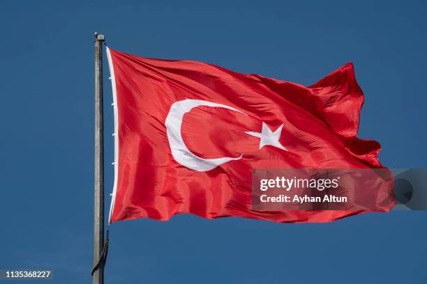 turkish flag (flag of the republic of turkey) - bandera turca fotografías e imágenes de stock