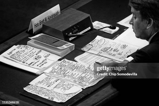 Supreme Court nominee Judge Brett Kavanaugh looks over his hand-written notes while testifying before the Senate Judiciary Committee on the third day...