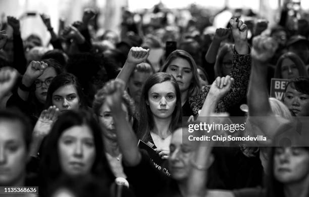 Hundreds of protesters rally in the Hart Senate Office Building while demonstrating against the confirmation of Supreme Court nominee Judge Brett...