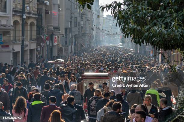 famous istiklal street in beyoglu district of istanbul,turkey - sea of marmara stock-fotos und bilder