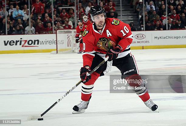 Patrick Sharp of the Chicago Blackhawks looks to pass the puck in Game Six of the Western Conference Quarterfinals against the Vancouver Canucks...