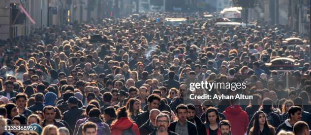 famous istiklal street in beyoglu district of istanbul,turkey - foule photos et images de collection