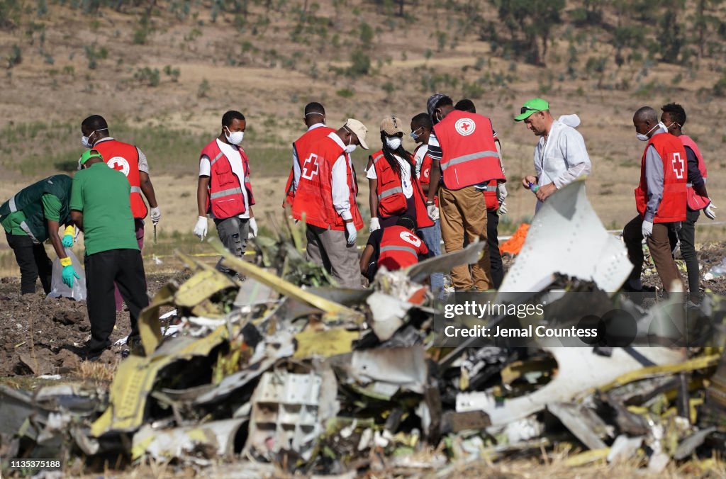 Emergency Services Work At The Crash Site Near Bishoftu Of Ethiopian Airlines ET302 To Nairobi