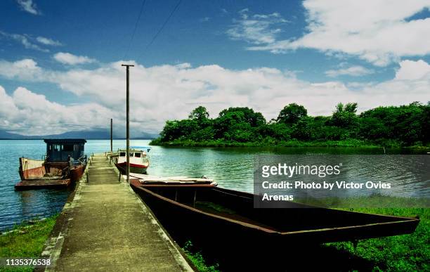 the jetty of macarron island,  in the tropical archipelago of solentiname in lake nicaragua - solentiname nicaragua stock pictures, royalty-free photos & images