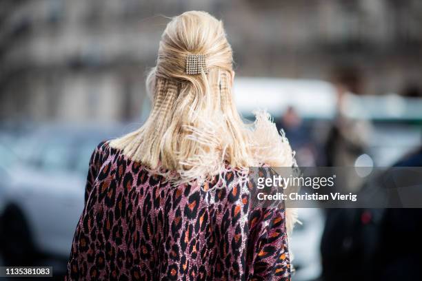 Leonie Hanne is seen wearing hair clip outside Miu Miu during Paris Fashion Week Womenswear Fall/Winter 2019/2020 on March 05, 2019 in Paris, France.