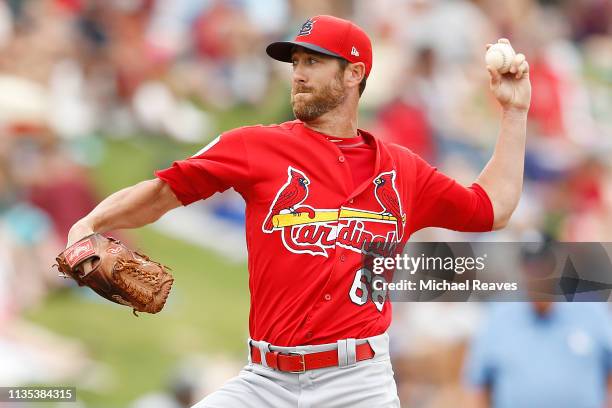 Tommy Layne of the St. Louis Cardinals delivers a pitch in the sixth inning against the Atlanta Braves during the Grapefruit League spring training...