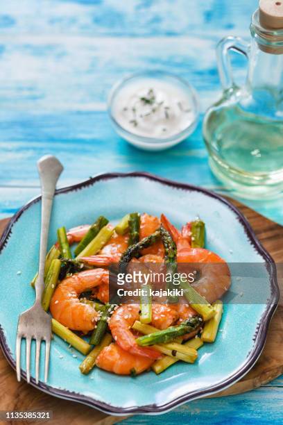grilled shrimps with asparagus - stir frying european stock pictures, royalty-free photos & images