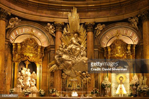 The Holy Chapel of the Basílica de Nuestra Señora del Pilar, with the wooden statue of the Virgin Mary on a column set in a golden frame, on October...