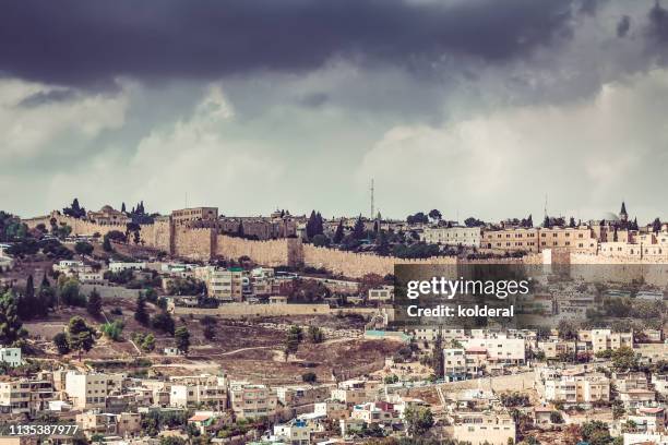 jerusalem under dramatic sky - palestinian territories stock pictures, royalty-free photos & images