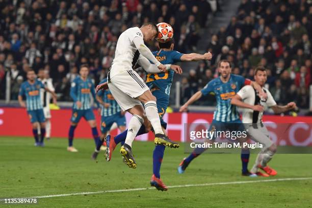 Cristiano Ronaldo of Juventus scores the opening goal during the UEFA Champions League Round of 16 Second Leg match between Juventus and Club de...