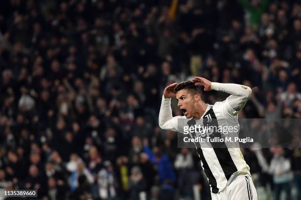 Cristiano Ronaldo of Juventus celebrates after scoring the opening goal during the UEFA Champions League Round of 16 Second Leg match between...