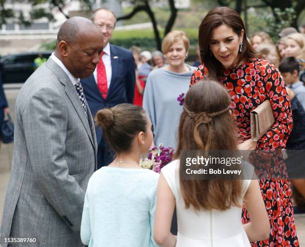 Mary, Crown Princess of Denmark and Mayor Sylvester Turner greet flower girls on a visit on March 12, 2019 in Houston,Texas .
