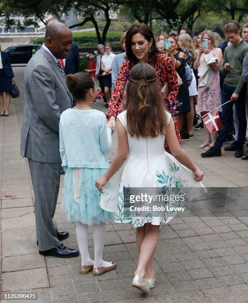 Mary, Crown Princess of Denmark and Mayor Sylvester Turner greet flower girls on a visit on March 12, 2019 in Houston,Texas .