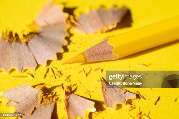 close-up of colored pencil and shavings - pencil shavings stock pictures, royalty-free photos & images