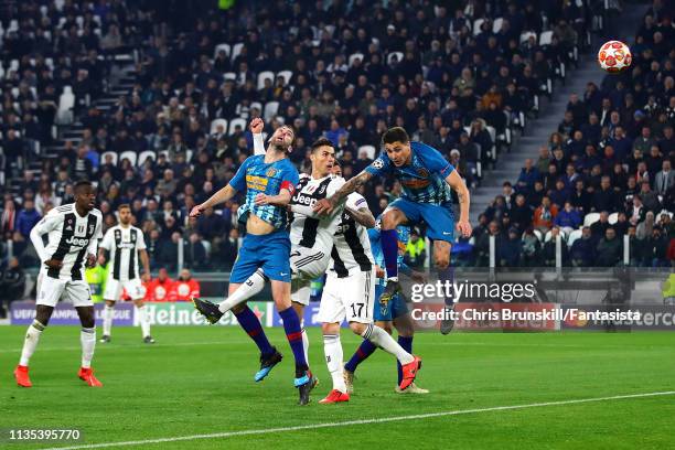 Cristiano Ronaldo of Juventus scores his side's second goal during the UEFA Champions League Round of 16 Second Leg match between Juventus and Club...