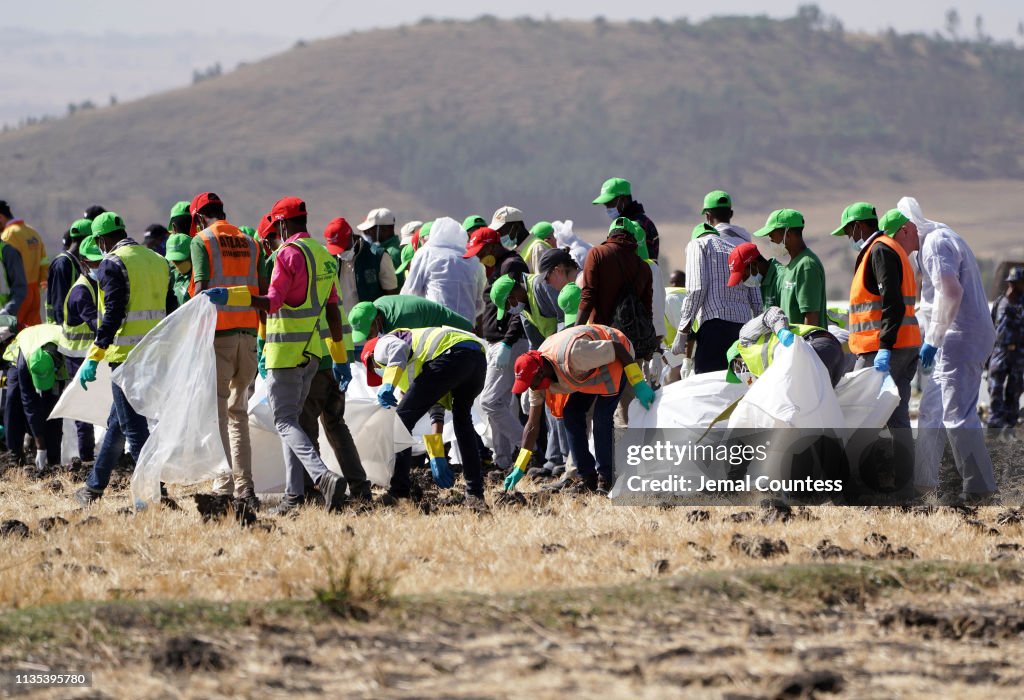 Emergency Services Work At The Crash Site Near Bishoftu Of Ethiopian Airlines ET302 To Nairobi