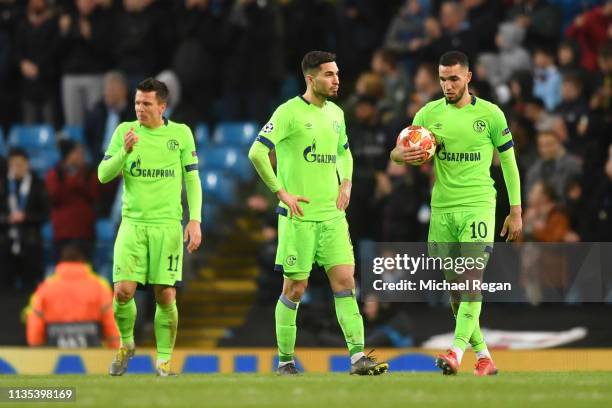 Nabil Bentaleb of FC Schalke 04 collects the ball and reacts after Manchester City score their 6th goal during the UEFA Champions League Round of 16...