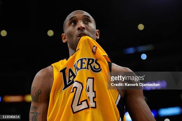 Kobe Bryant of the Los Angeles Lakers reacts late in the fourth quarter while taking on the Dallas Mavericks in Game One of the Western Conference...