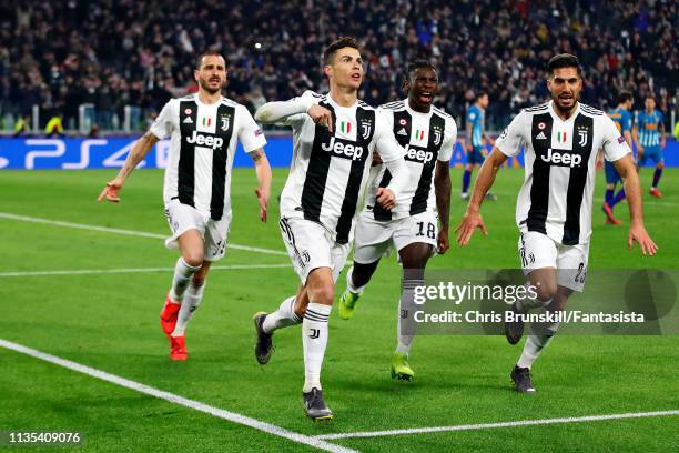 Cristiano Ronaldo of Juventus celebrates scoring his sides third goal from the penalty spot during the UEFA Champions League Round of 16 Second Leg...