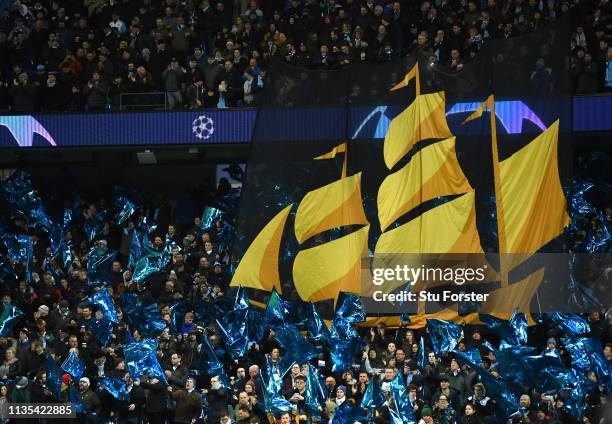 The Manchester City Ship sails across the fans sea of blue banners before the UEFA Champions League Round of 16 Second Leg match between Manchester...