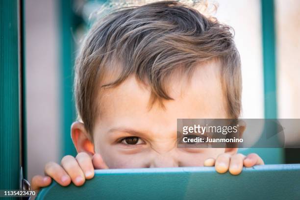 very upset three years old boy looking at the camera - 2 3 years stock pictures, royalty-free photos & images