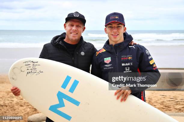 Pierre Gasly of France and Red Bull Racing poses for a photo after surfing with surf legend Mick Fanning during previews ahead of the F1 Grand Prix...