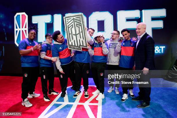 76ers Gaming Club receive the Tip Off Trophy from Managing Director Brendan Donohue after beating Celtics Crossover Gaming during the Finals of the...