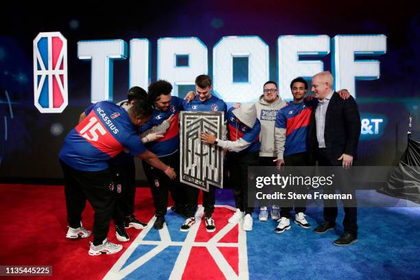 76ers Gaming Club receive the Tip Off Trophy from Managing Director Brendan Donohue after beating Celtics Crossover Gaming during the Finals of the...