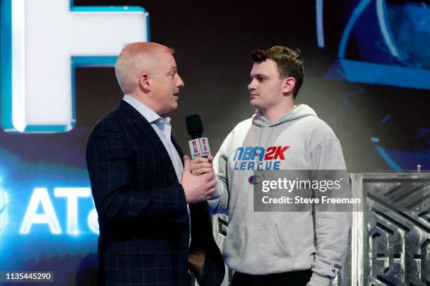 Managing Director Brendan Donohue speaks to Jamie Ruiz after the Finals of the NBA 2K League Tip Off Tournament between 76ers Gaming Club and Celtics...