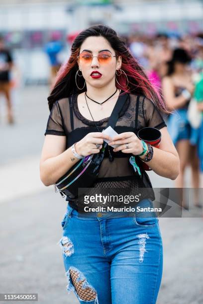 Street style seen on day two of the Lollapalooza Brazil Music Festival at Interlagos Racetrack on April 06, 2019 in Sao Paulo, Brazil.