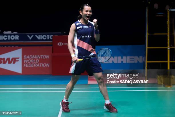 Tai Tzu Ying of Taiwan celebrates winning the women's singles final match against Akane Yamaguchi of Japan at the Malaysia Open badminton tournament...