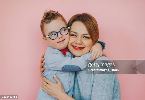 Tender feelings between mom and son with Down syndrome