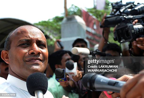 Sri Lankan former international cricket captain Hashan Tillakaratne speaks to the media in Colombo on May 3, 2011. Sri Lanka's former international...