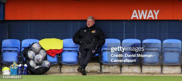 Blackpool's Manager Terry McPhillips surveys Kenilworth Road from the away dugout during the Sky Bet League One match between Luton Town and...