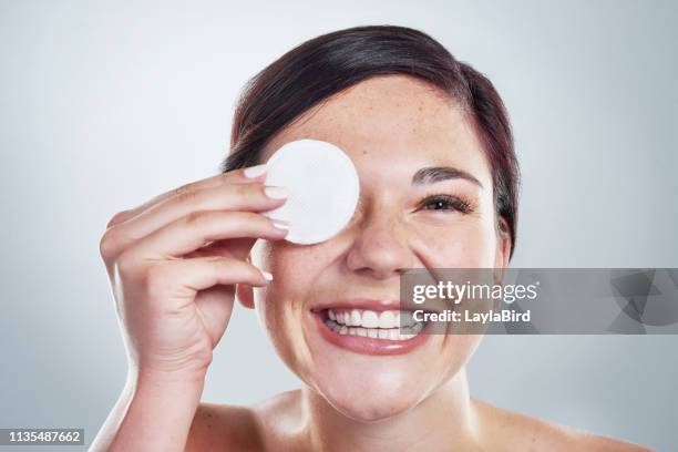 sleep, drink water and treat your skin - cotton pad stock pictures, royalty-free photos & images