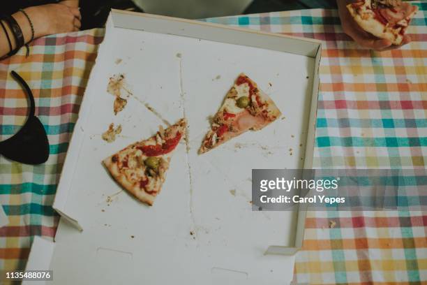 slice of tasty pizza with ham and tomatoes in box - fruit carton stock pictures, royalty-free photos & images