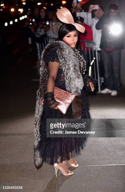 Lil' Kim arrives to wedding reception for Char Defrancesco and Marc Jacobs at The Grill and The Pool on April 6, 2019 in New York City.